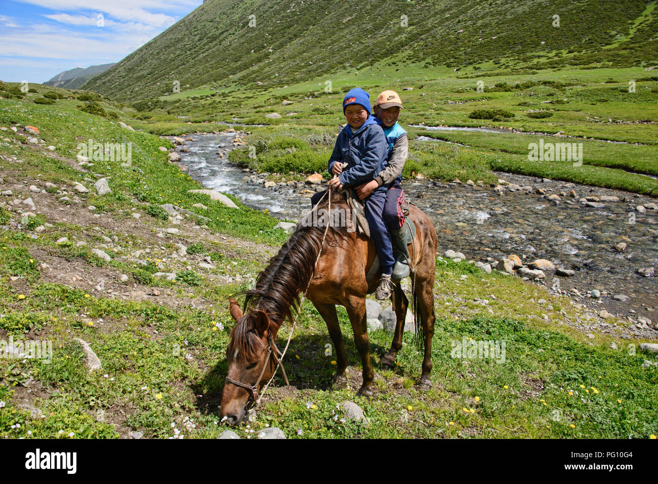 Horserider kirghisa, Jyrgalan Valley, Kygyzstan Foto Stock