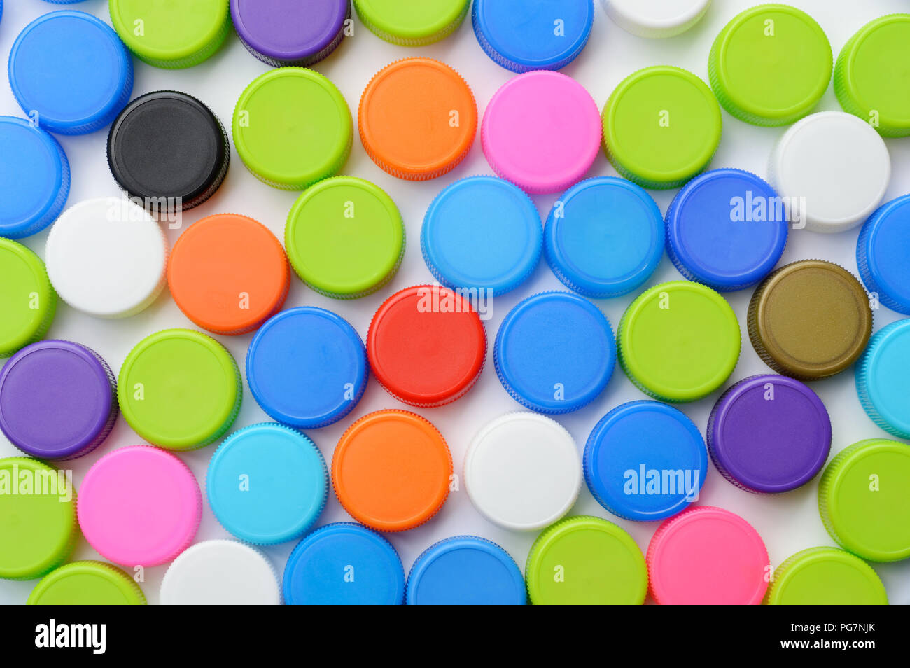 Colorato tappo in plastica per bottiglie di sfondo Foto stock - Alamy