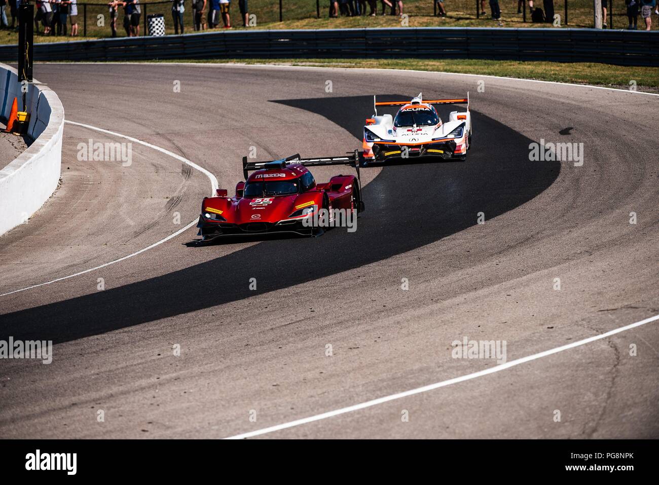 Bowmanville, può., 08 lug 2018. 8 Luglio, 2018. Il numero 55 Mazda DPi, guidato dal team di Jonathan Bomarito e Harry Tincknell, nel prototipo serie, entra nel diritto di spazzamento del turno 1 su 08 di luglio, 2018 a Canadian Tire Motorsport Park durante la Mobil 1 SportsCar Grand Prix weekend. Credito: Victor Biro/ZUMA filo/Alamy Live News Foto Stock