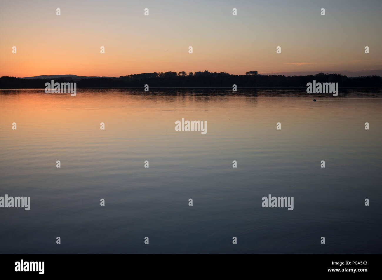 Tramonto su Loch di Skene Foto Stock