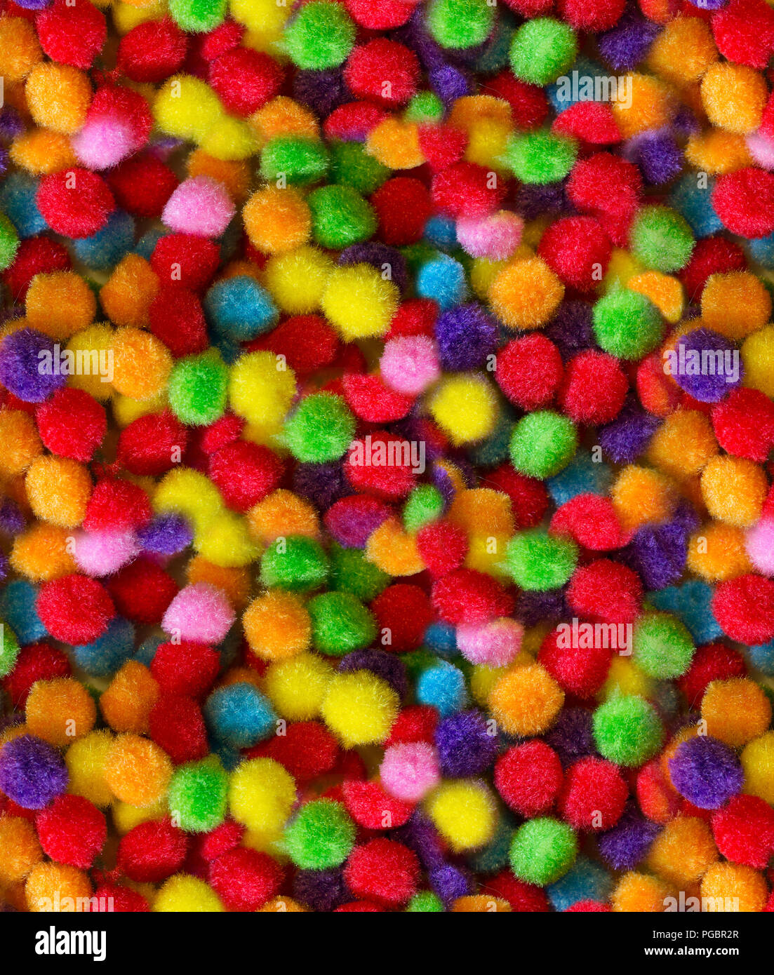 Multi-colore di craft pompon, un luminoso sfondo astratto. Foto Stock