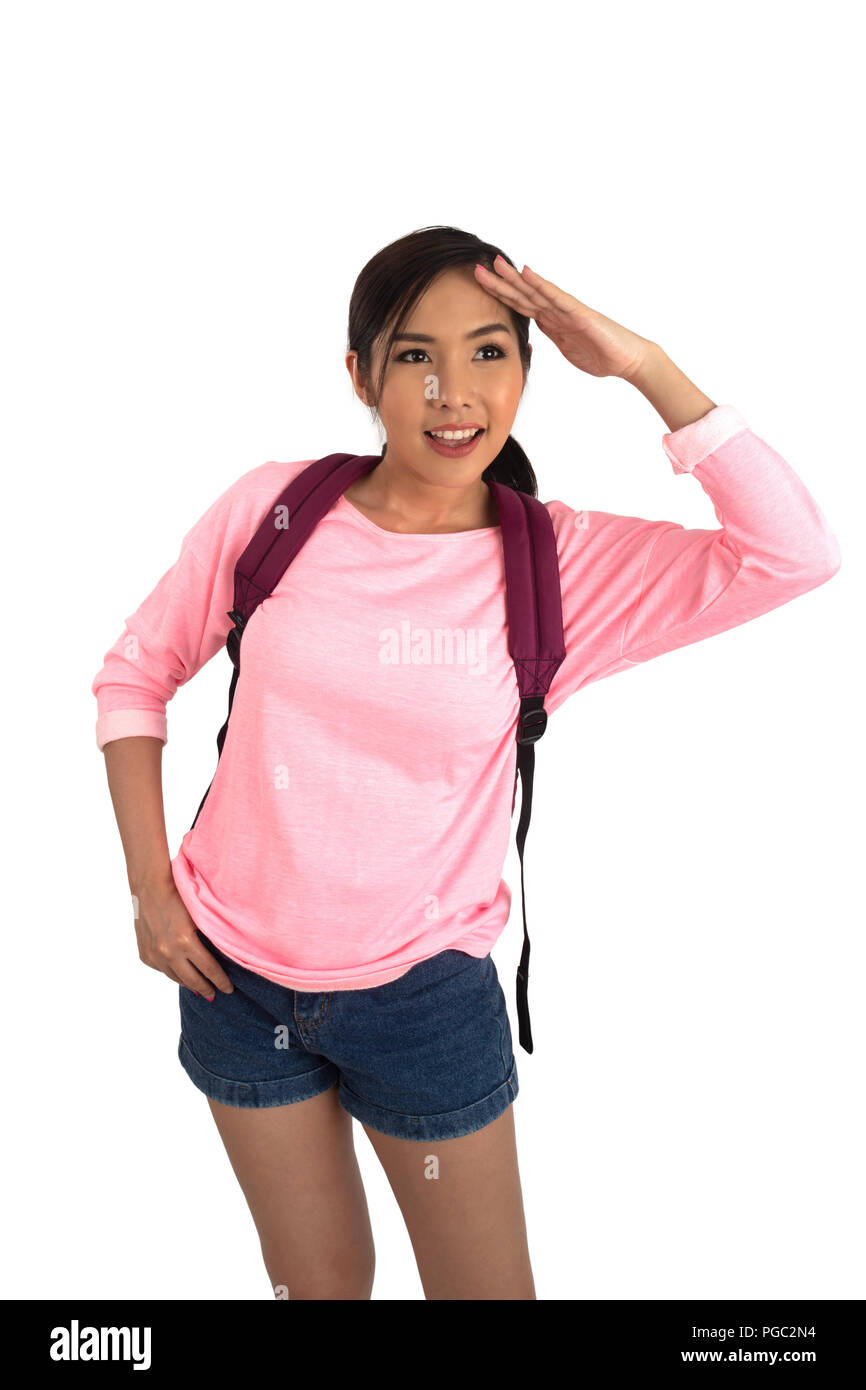 Ritratto di bellezza ragazza asiatica in t-shirt rosa e blu jean corti con zaino in cerca di qualcosa. Foto Stock