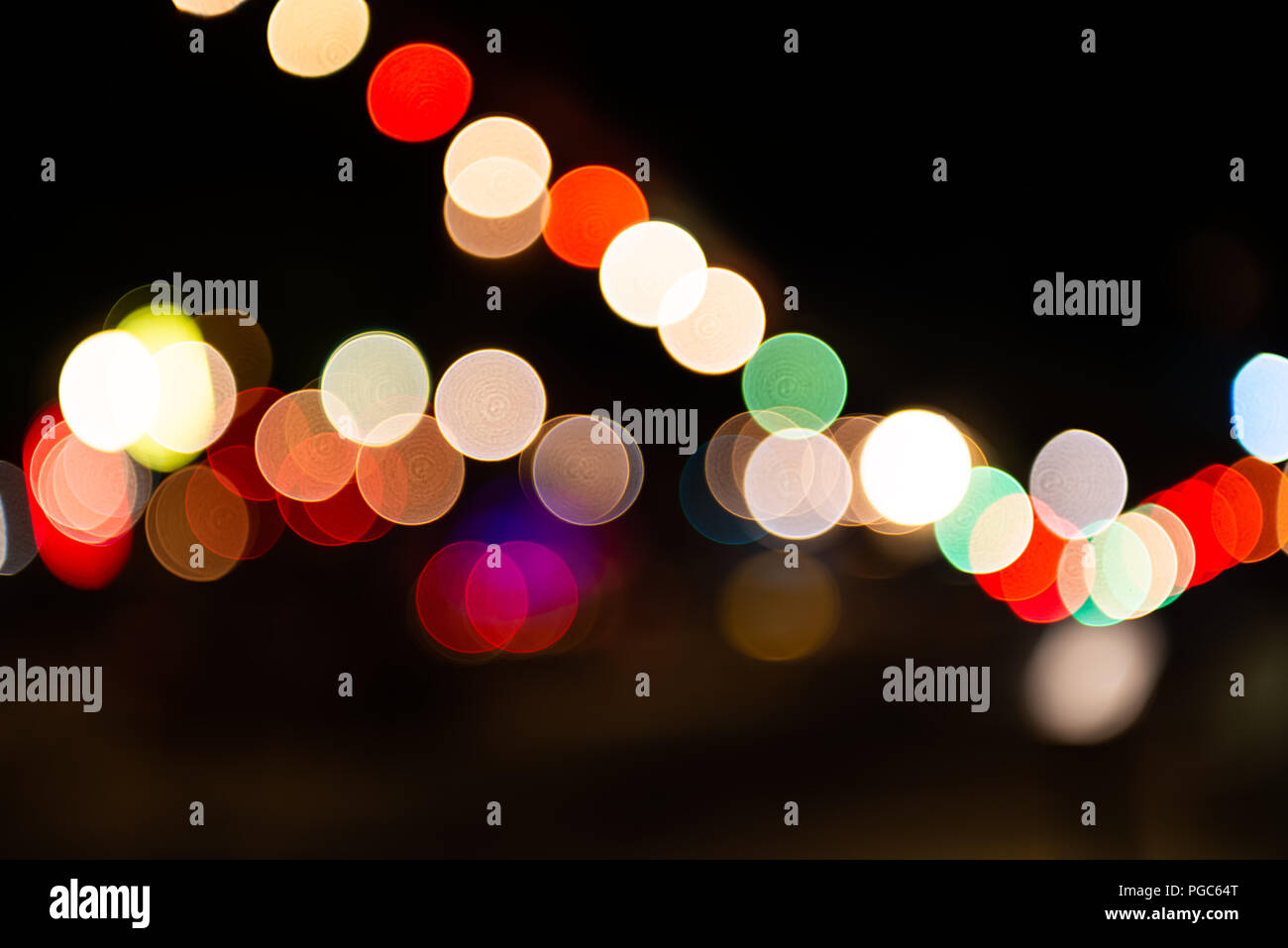 Sovrapposizione cerchio di colore di bokeh da illuminazione notturna. Foto Stock