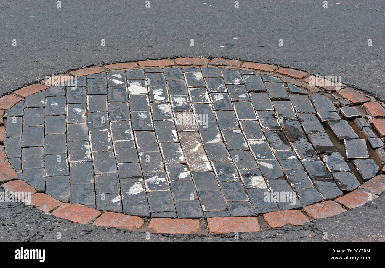 Edimburgo SCOZIA CANONGATE e Royal Mile AREA su strada la marcatura del sito dell'originale ST JOHNS CROSS Foto Stock