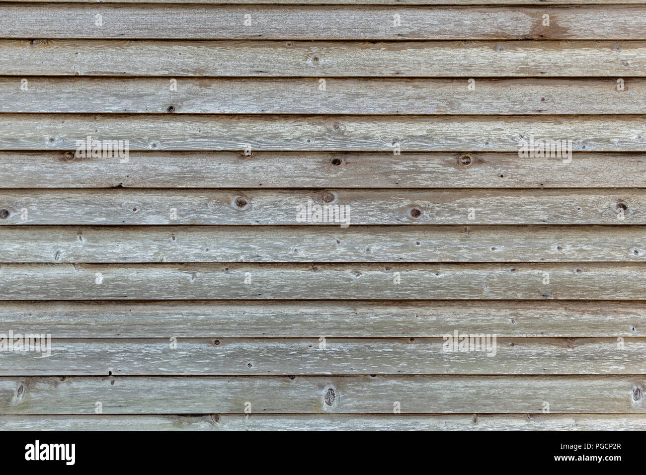 Asse di legno schierata da un vecchio west edificio di stile, marrone, texture - Davie, Florida, Stati Uniti d'America Foto Stock