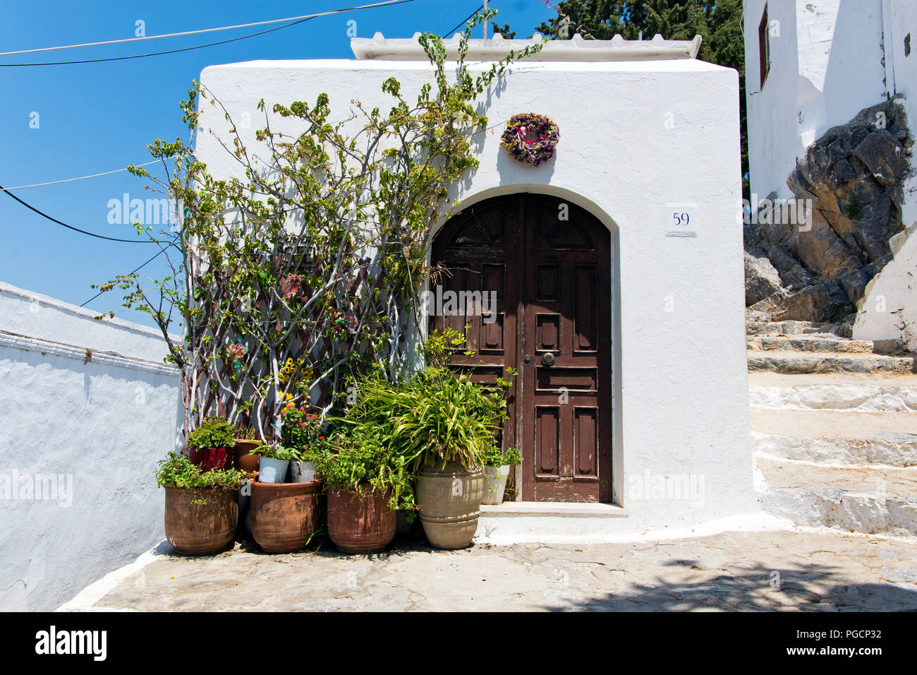 Tradizionale portale ornato, Lindos sull'isola greca di Rodi Foto Stock