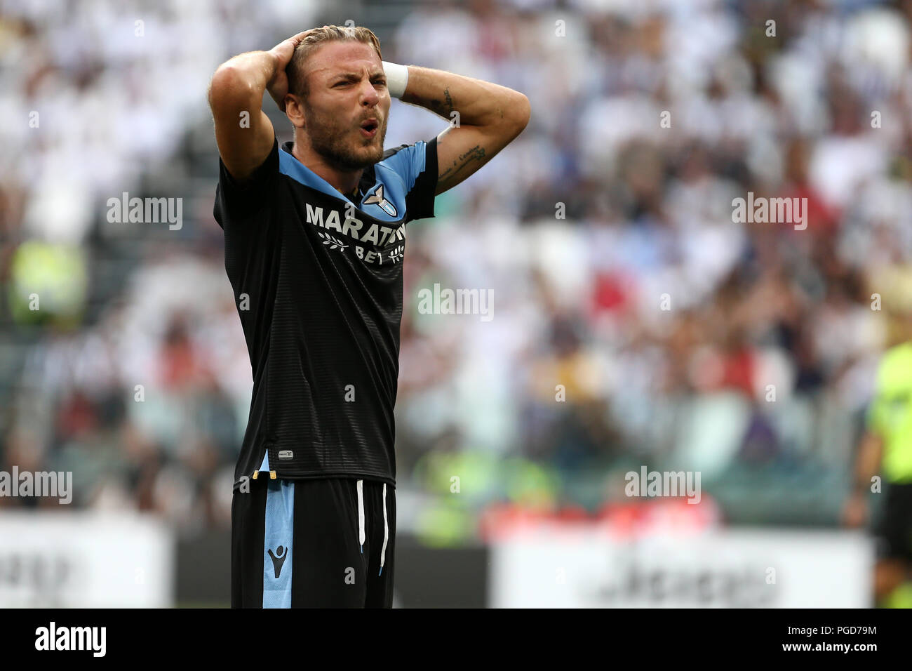 Torino, Italia. Il 25 agosto, 2018. Ciro immobile di SS Lazio scompare durante la serie di una partita di calcio tra Juventus e SS Lazio. Credito: Marco Canoniero / Alamy Live News . Credito: Marco Canoniero/Alamy Live News Foto Stock