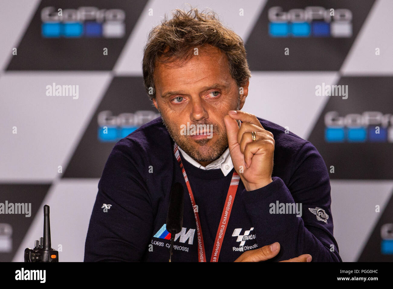 Gara di Silverstone Circuit, Northamptonshire, Regno Unito. 26 Ago, 2018. GoPro British Grand Prix MotoGP, il giorno della gara; MotoGP consulente di sicurezza Loris Capirossi spiega perché il Grand Prix è stato annullato il credito: Azione Plus sport/Alamy Live News Foto Stock