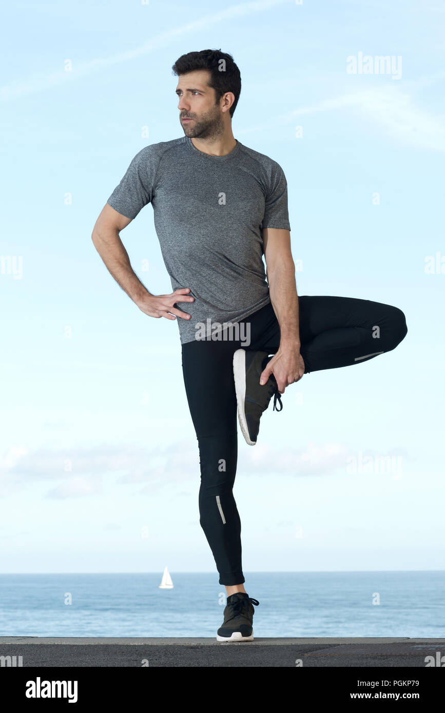 Runner si allunga la gamba Foto Stock