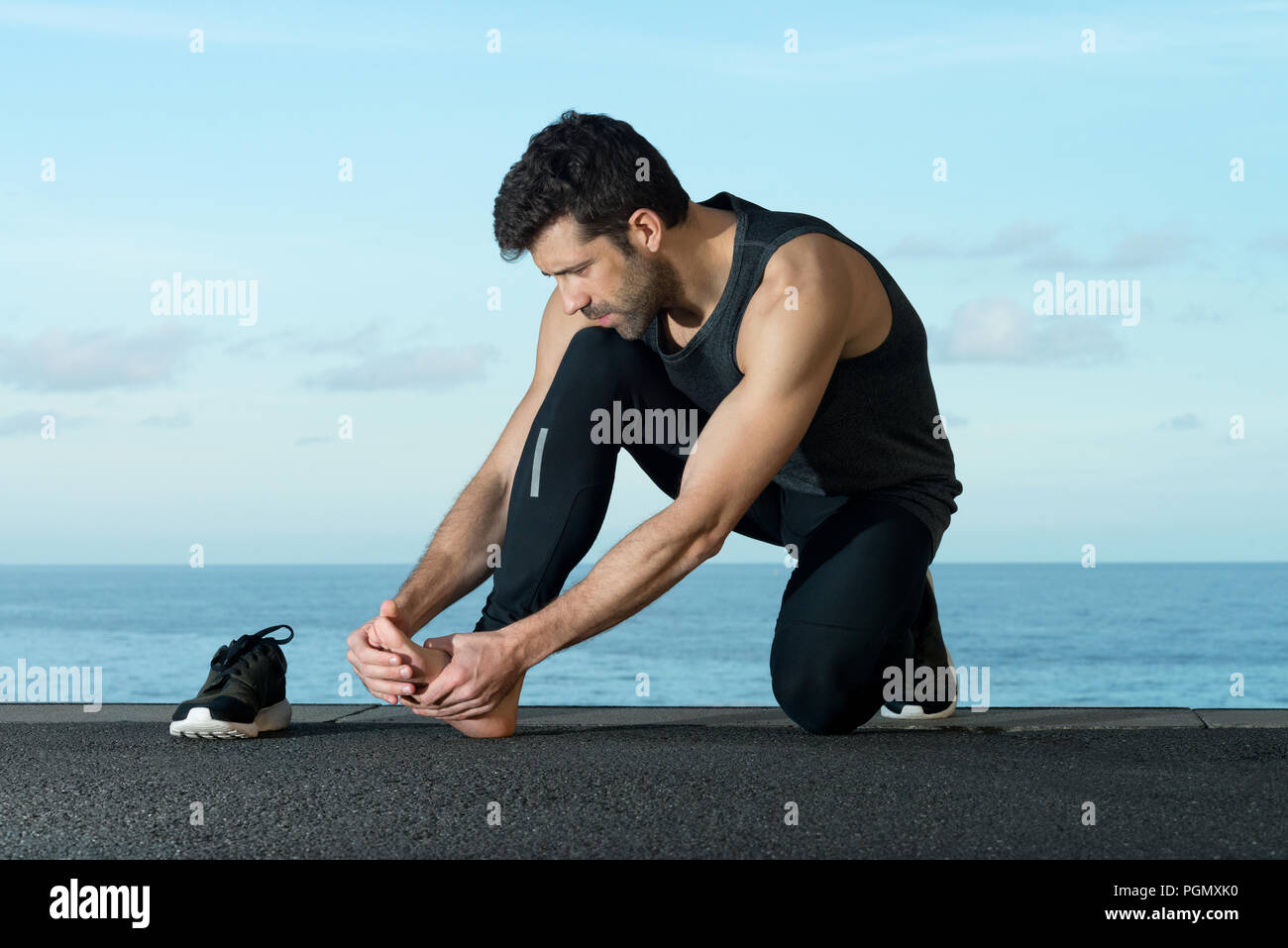 Atleta con lesioni del piede Foto Stock
