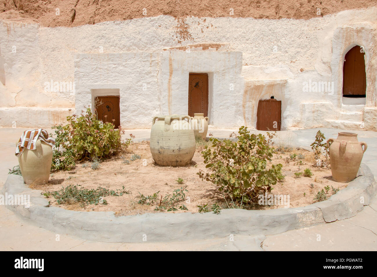 Cortile del berbero abitazioni sotterranee, Matmata, Tunisa Foto Stock