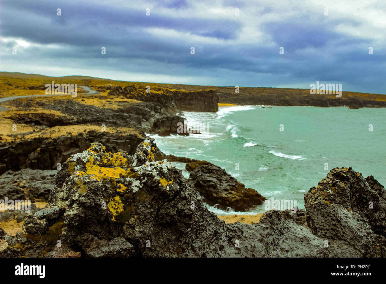 Penisola snaefellsnes nella costa occidentale di Islanda, noto per il paesaggio idilliaco e roccia vulcanica Foto Stock