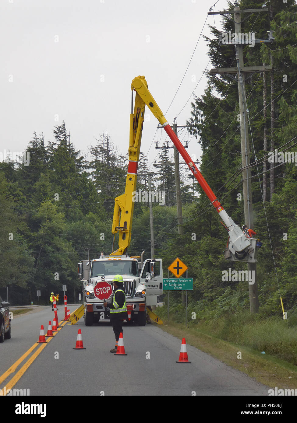 Gli uomini al lavoro l'isola di Vancouver, British Columbia, Canada 2018 Foto Stock
