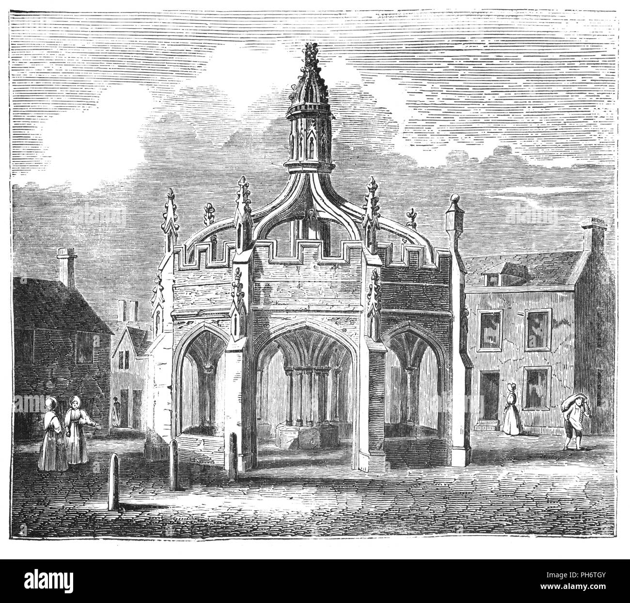 Malmesbury Market Cross aka "Birdcage', è un tardo XV secolo struttura nella città di Malmesbury, Wiltshire, Inghilterra. In piedi al centro della città, fu costruito c.1490, possibilmente utilizzando calcare recuperati dalla recentemente rovinato in parte di Malmesbury Abbey. Un riccamente intagliati struttura ottagonale del periodo perpendicolare, è riconosciuto come uno dei meglio conservati del suo genere in Inghilterra. Un intaglio della Crocifissione e le figure dei santi sono sopravvissuti alla riforma sulla lanterna aperta. L'edificio serve ancora al riparo agli operatori di mercato di giorno e come punto di incontro di notte. Foto Stock