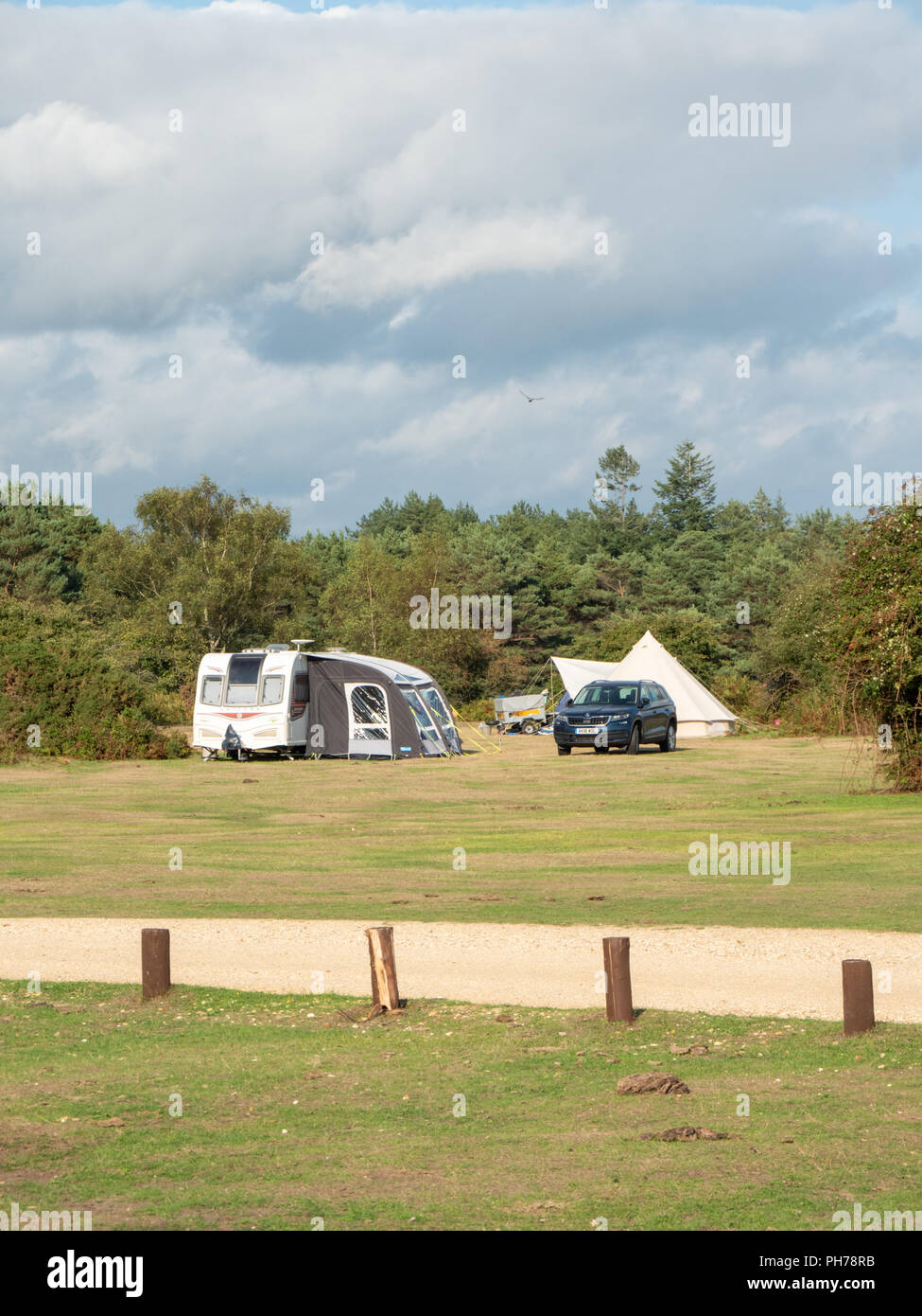 Caravan e tende sulla Roundhill Campeggio e roulotte vicino Brokenhurst nella nuova foresta Hampshire REGNO UNITO parte del Campeggio nella catena di foresta Foto Stock