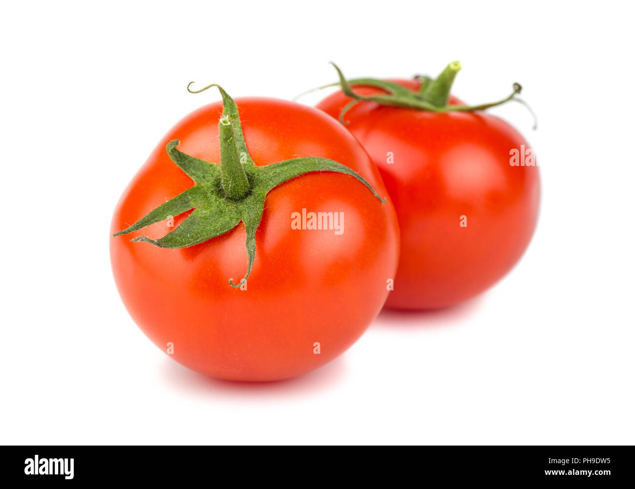 Due mature pomodori rossi Foto Stock
