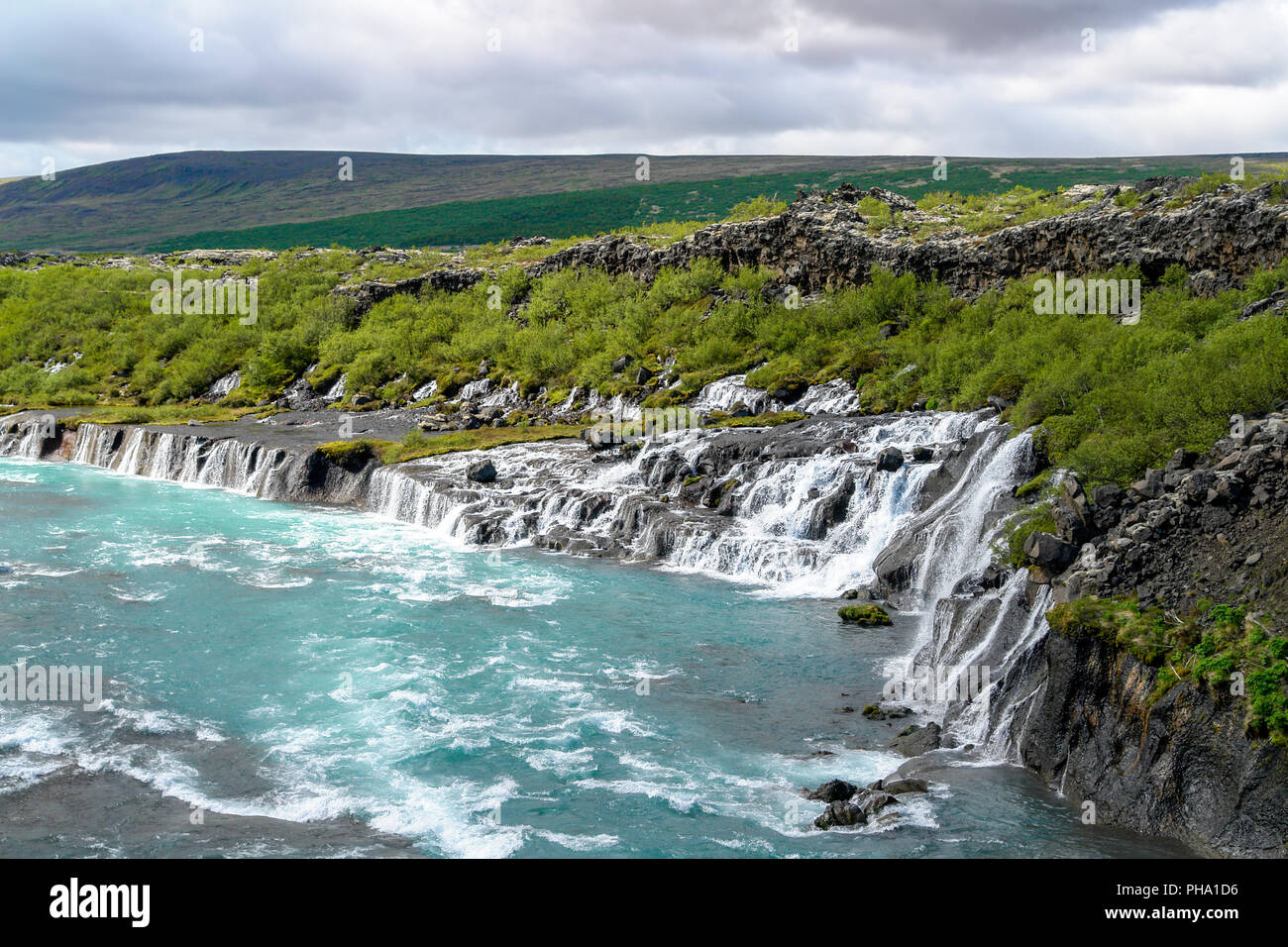Cascate Hraunfossar - Western Islanda Foto Stock
