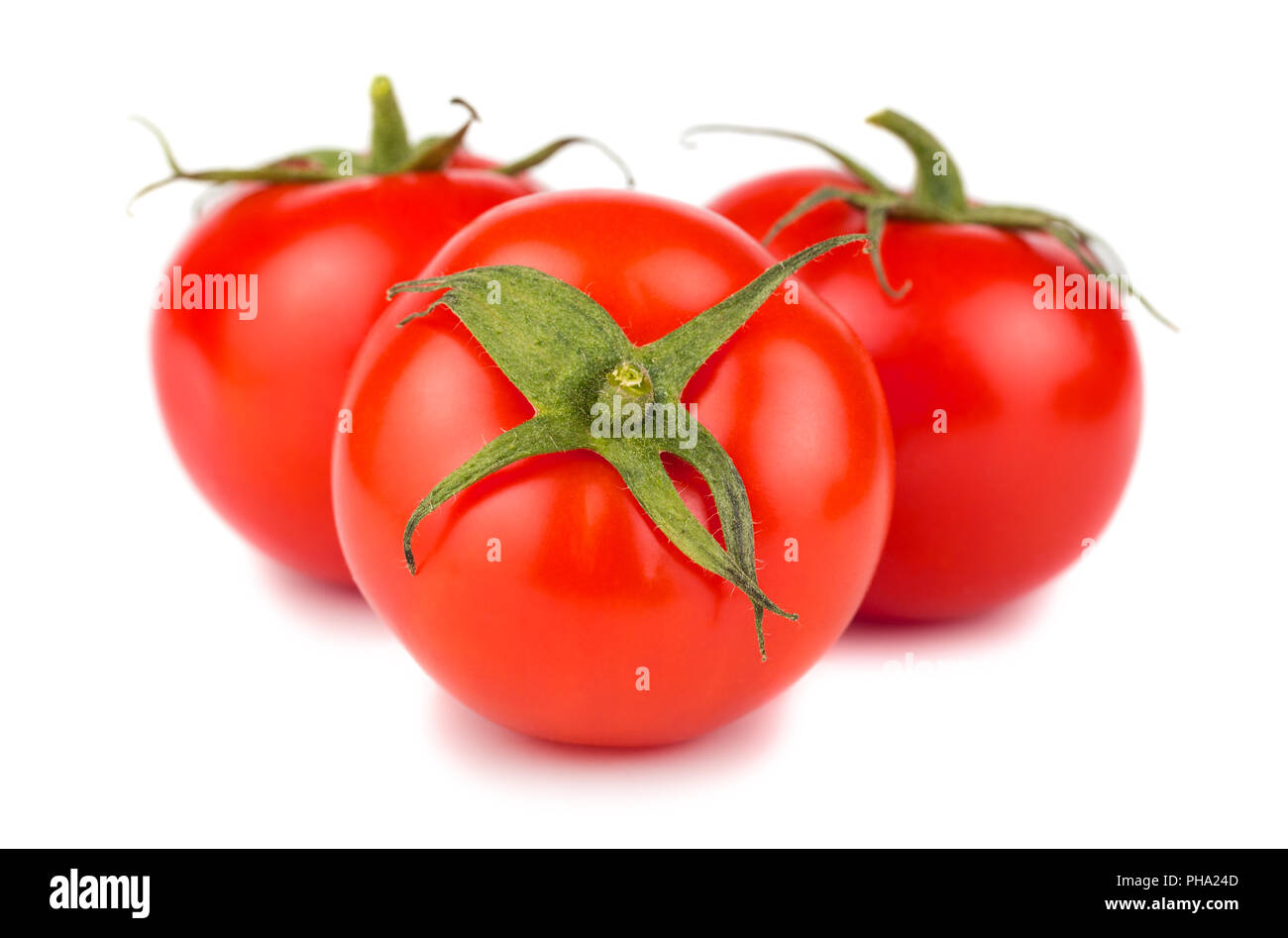 Tre mature pomodori rossi Foto Stock