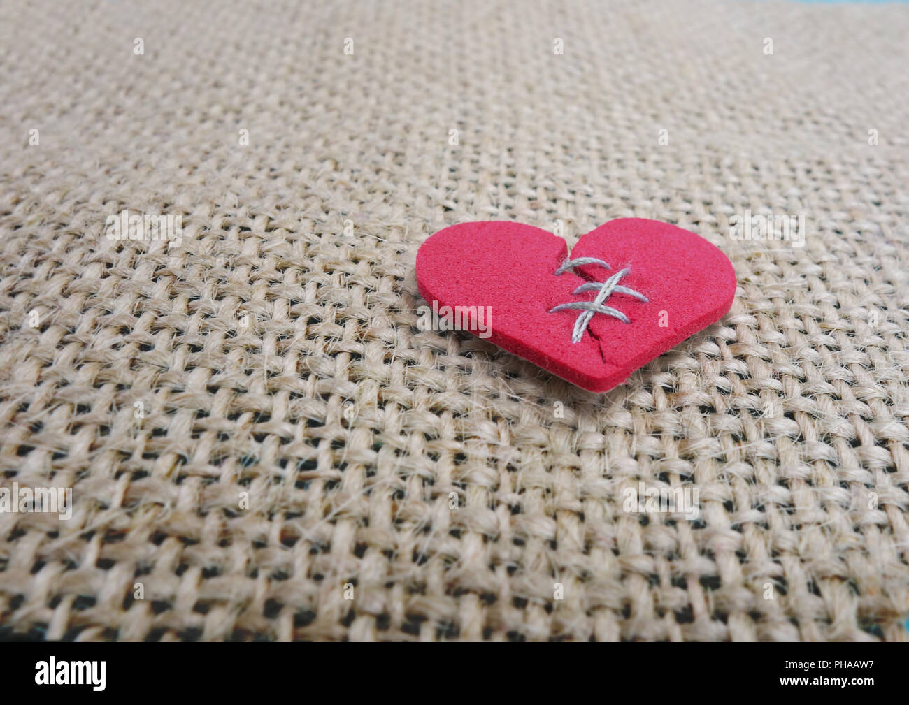 Cucito cuore spezzato Foto Stock