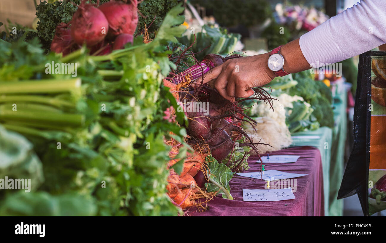 Supportare il vostro mercato locale Foto Stock
