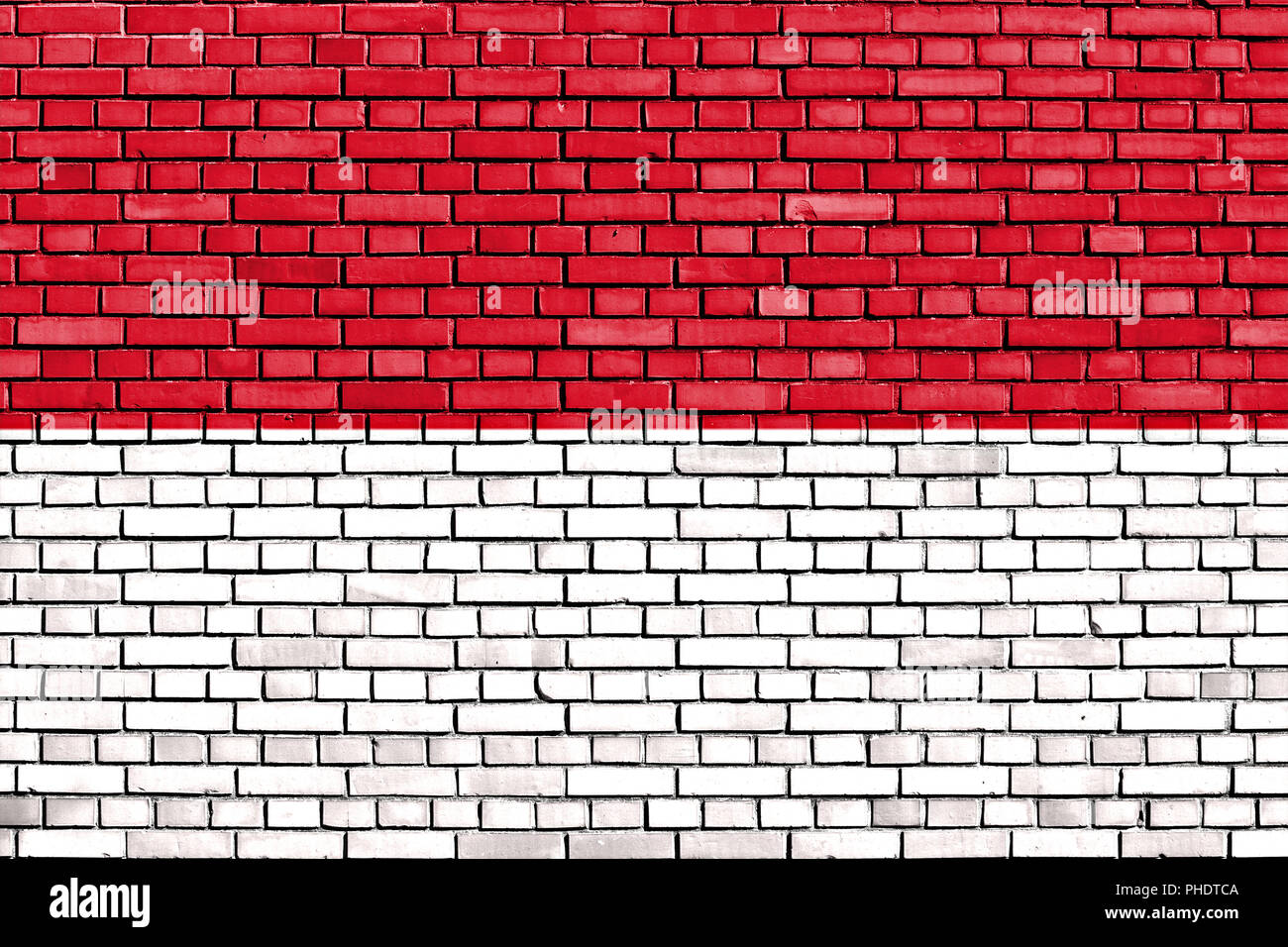 Bandiera di Indonesia dipinta su un muro di mattoni Foto Stock