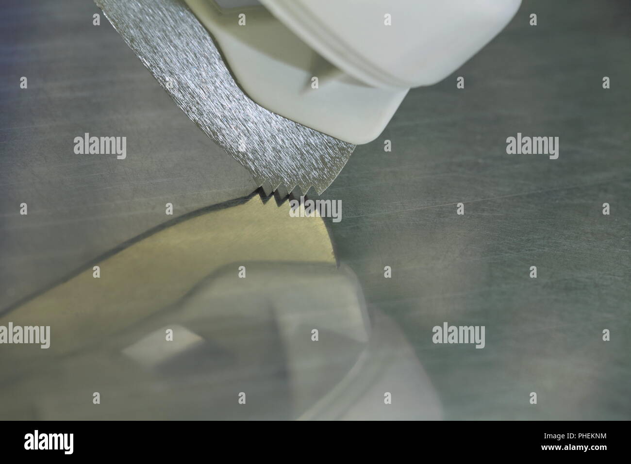 Denti taglienti dei pattini da ghiaccio Foto Stock