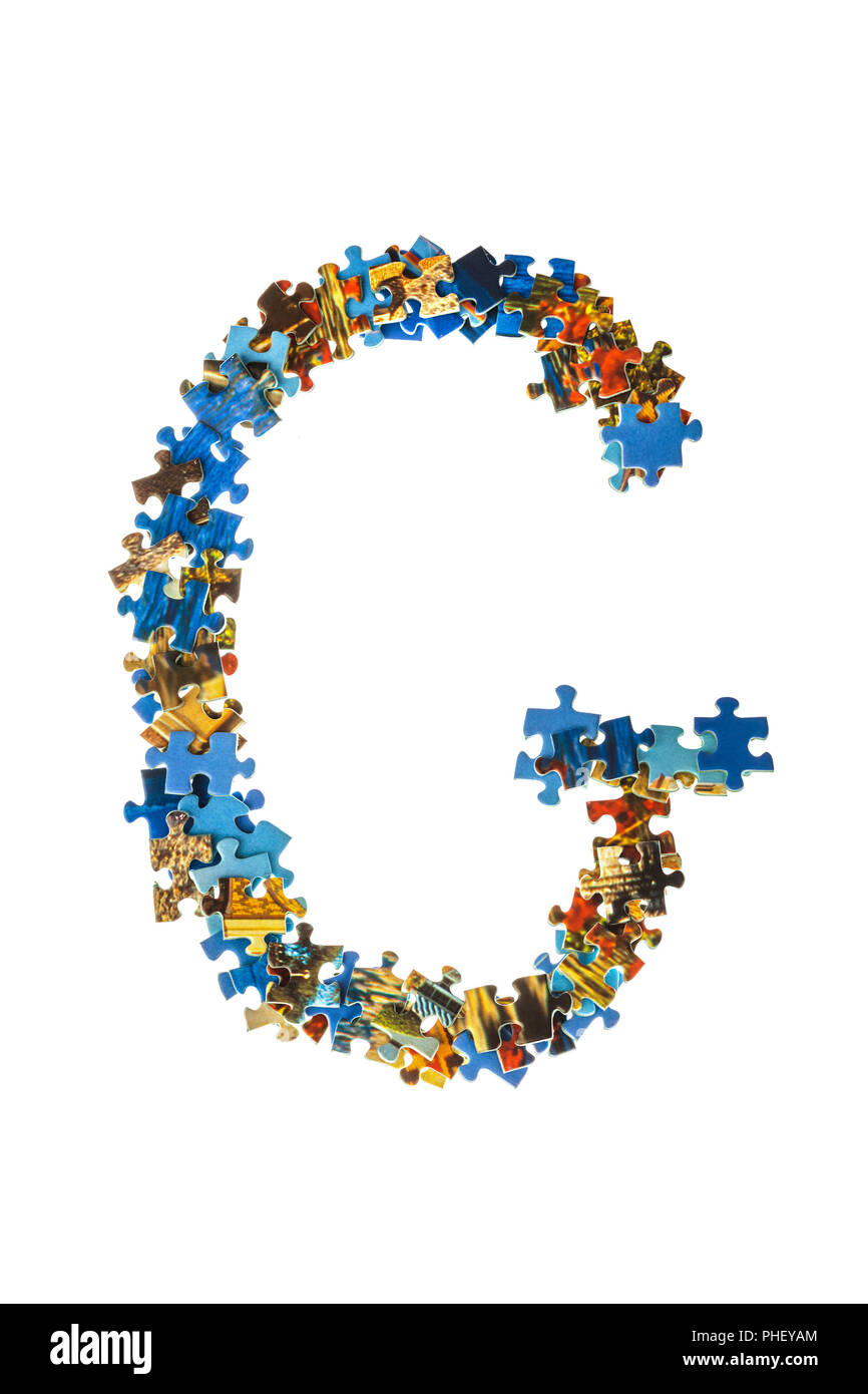 Lettera G fatta di pezzi di un puzzle Foto Stock