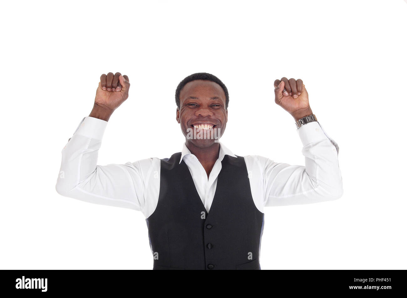 Felice l'uomo africano con le mani alzate Foto Stock