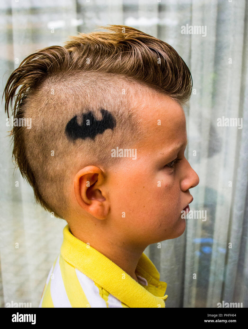 Bambino mohawk acconciatura Foto Stock