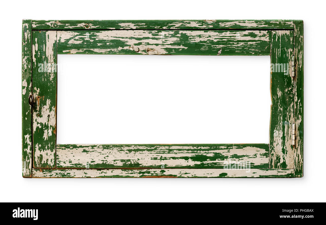 Molto vecchio vuoto il telaio in legno, verniciato di verde, isolato su bianco Foto Stock