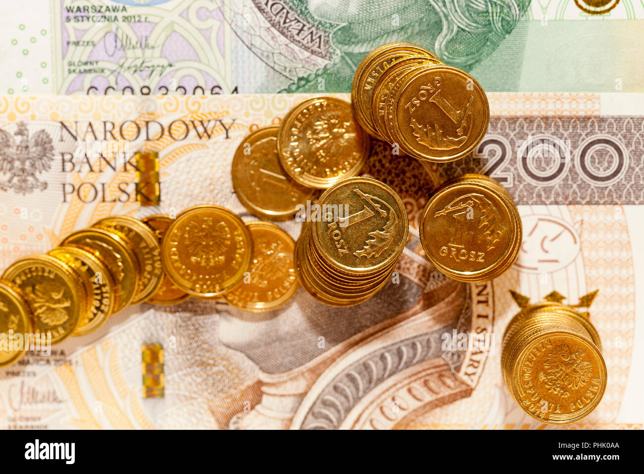 Fotografato vicino a denaro polacco - Polish zloty, le banconote e le monete in euro Foto Stock