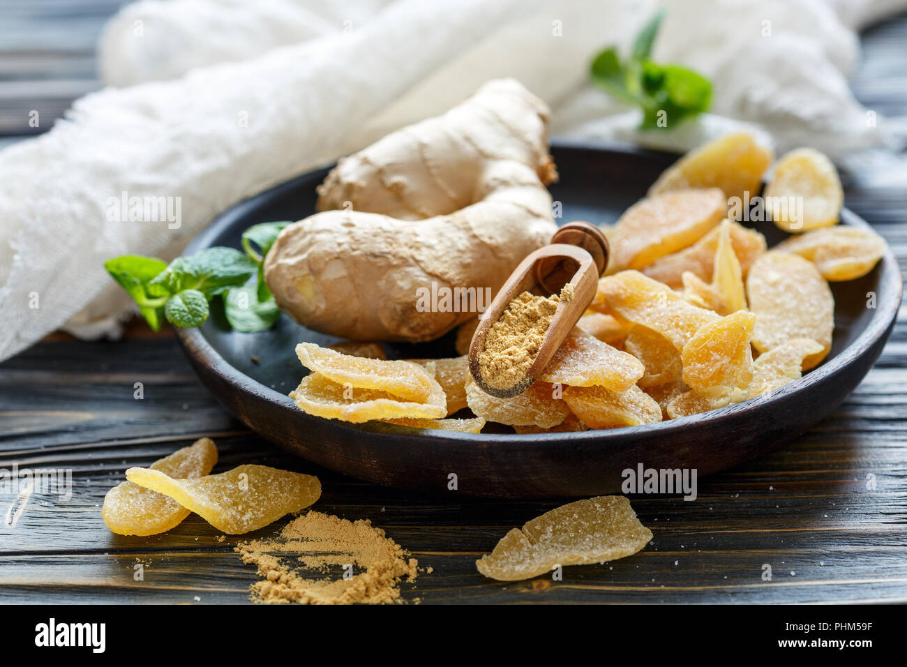 E radice di zenzero in polvere, lo zenzero piccante frutta candita. Foto Stock