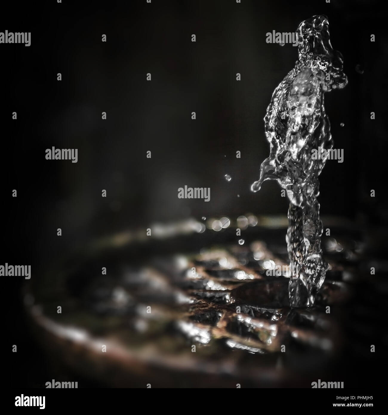 Acqua Splash congelare il movimento come figura umana Foto Stock