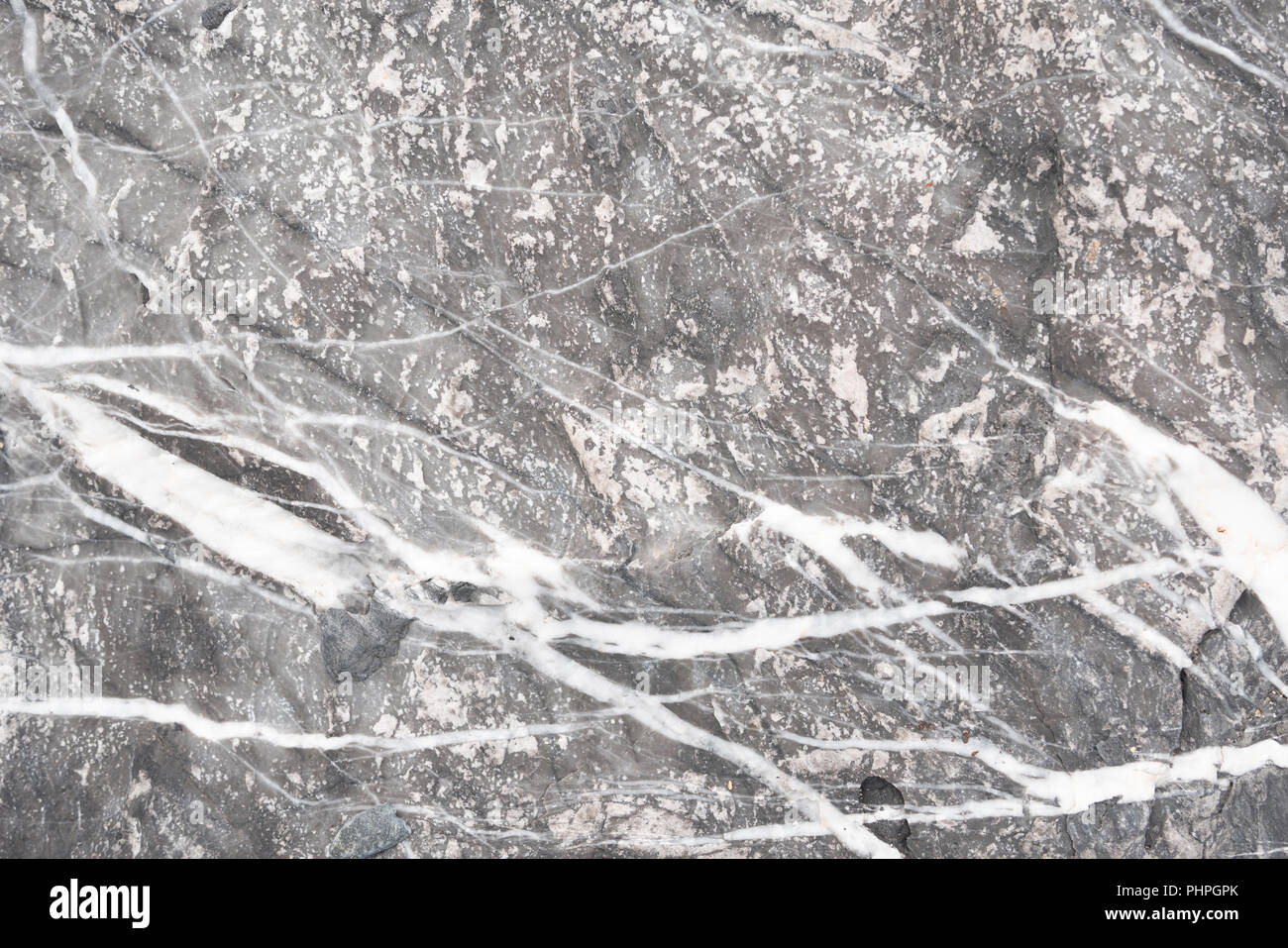 Abstract background e texture di pietra nera e strisce bianche. Linea di pattern di roccia Foto Stock