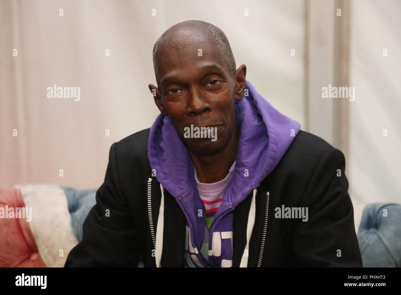 Knebworth Park, Herfordshire, UK. Il 2 settembre, 2018. Maxi Jazz pone per un ritratto dietro le quinte il secondo giorno del primo Cool Britannia Festival di Knebworth Park. Foto Stock