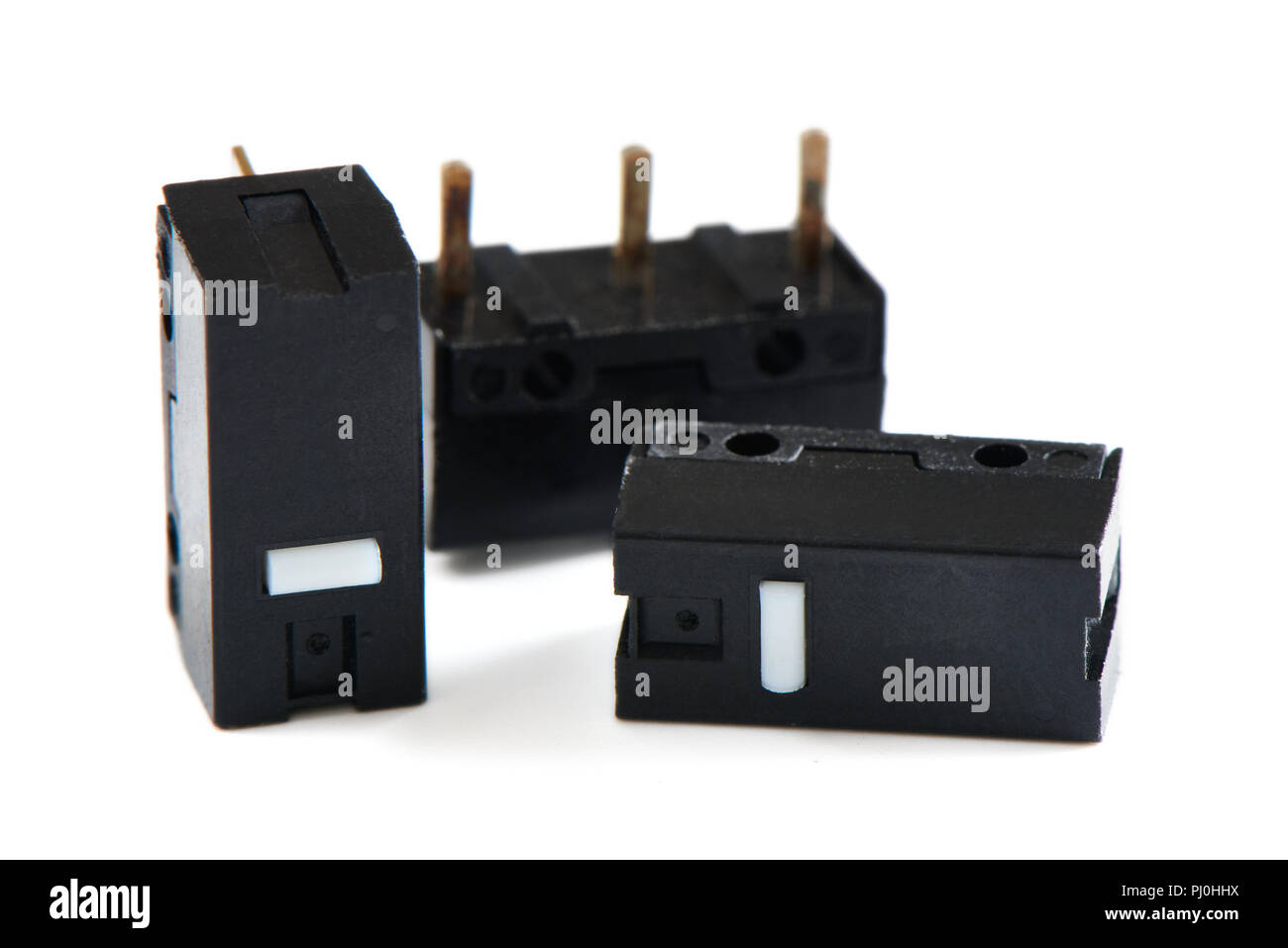 Ultraminiaturizzati di micro interruttore per il mouse del computer su sfondo bianco Foto Stock