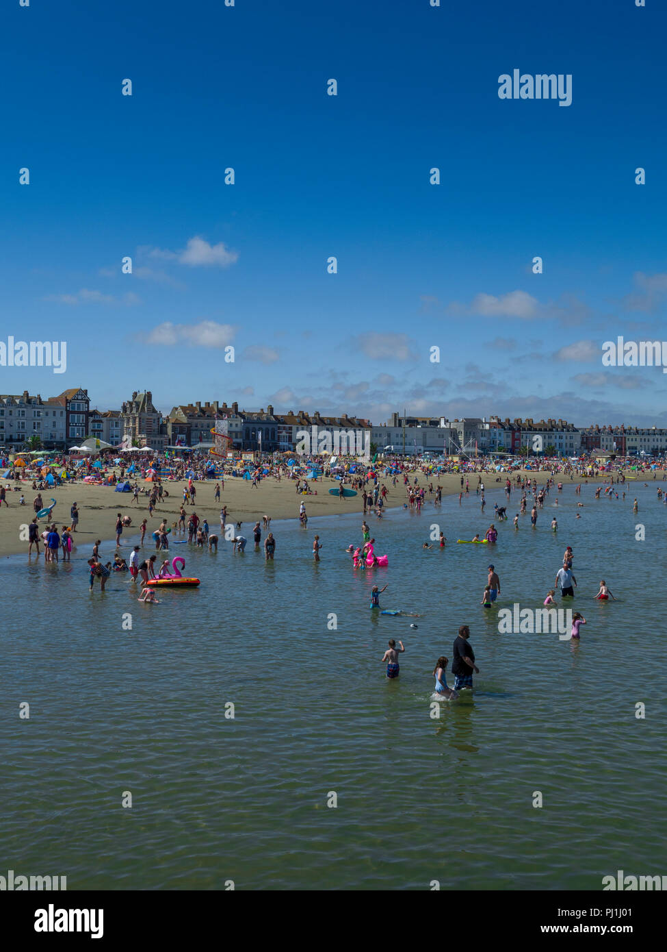 Busy Summer Day a Weymouth beach, Weymouth Dorset, England, Regno Unito Foto Stock
