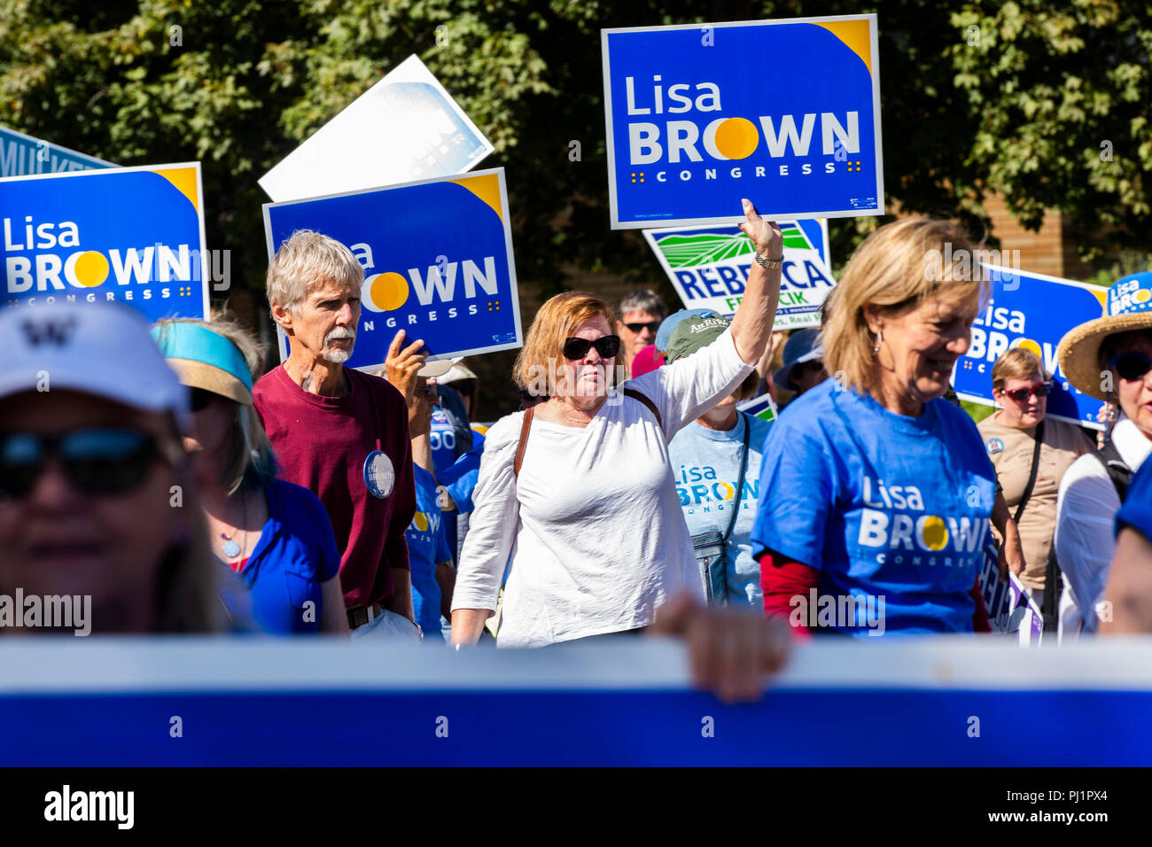 I sostenitori di Lisa Brown, un candidato democratico in esecuzione per rappresentare Washington del quinto quartiere congressuale, marzo nella frontiera annuale giorni Parad Foto Stock