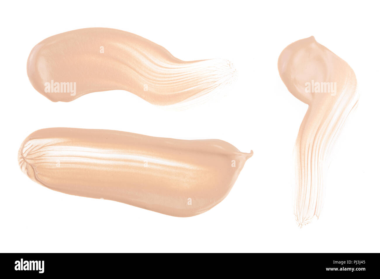 Il beige fondotinta liquido trucco isolato su sfondo bianco Foto Stock