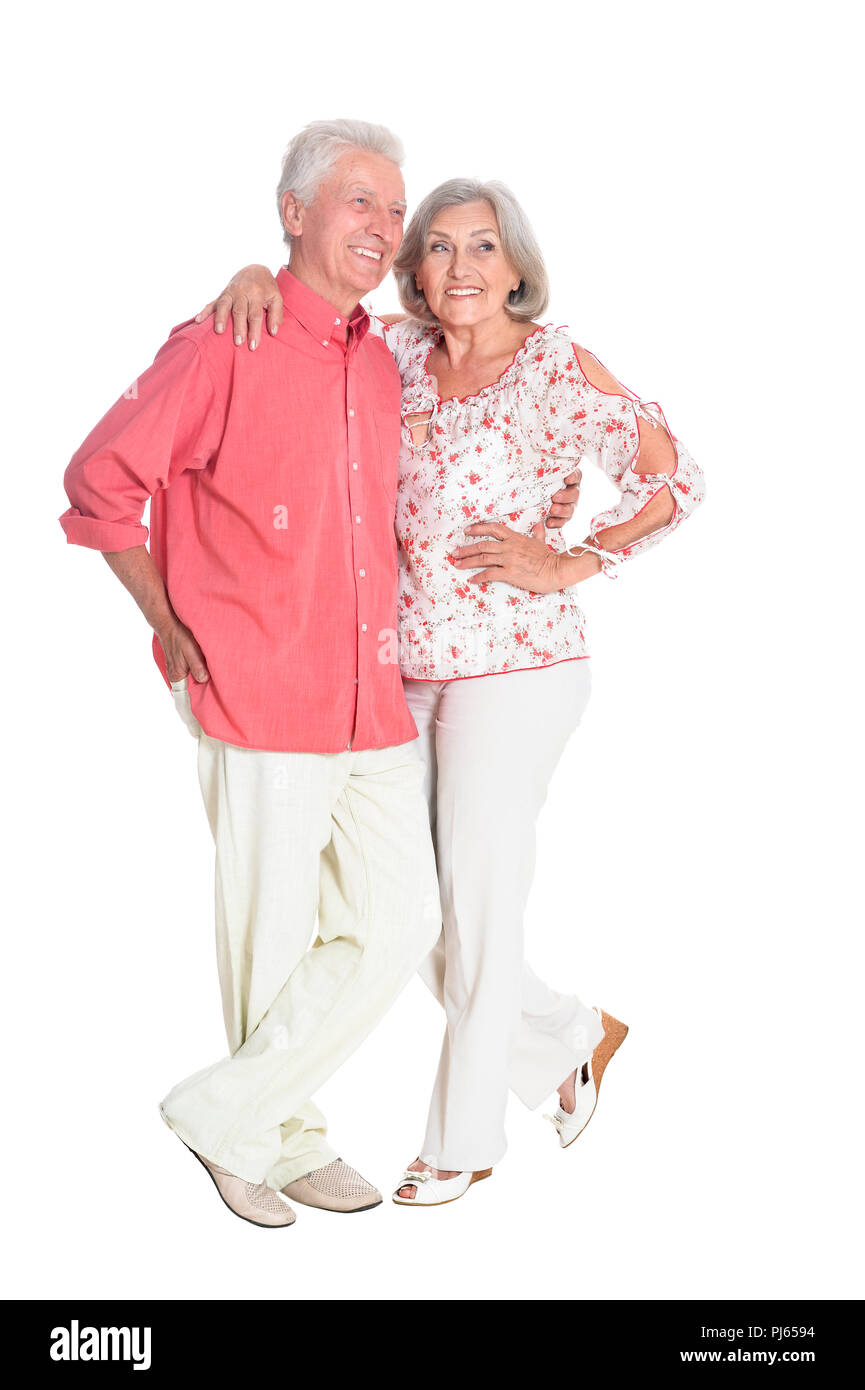 Felice coppia senior in posa su sfondo bianco Foto Stock