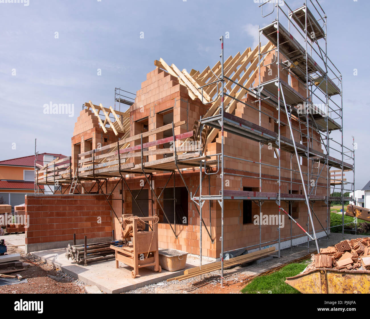 Sito di costruzione di una nuova casa di costruzione Foto Stock