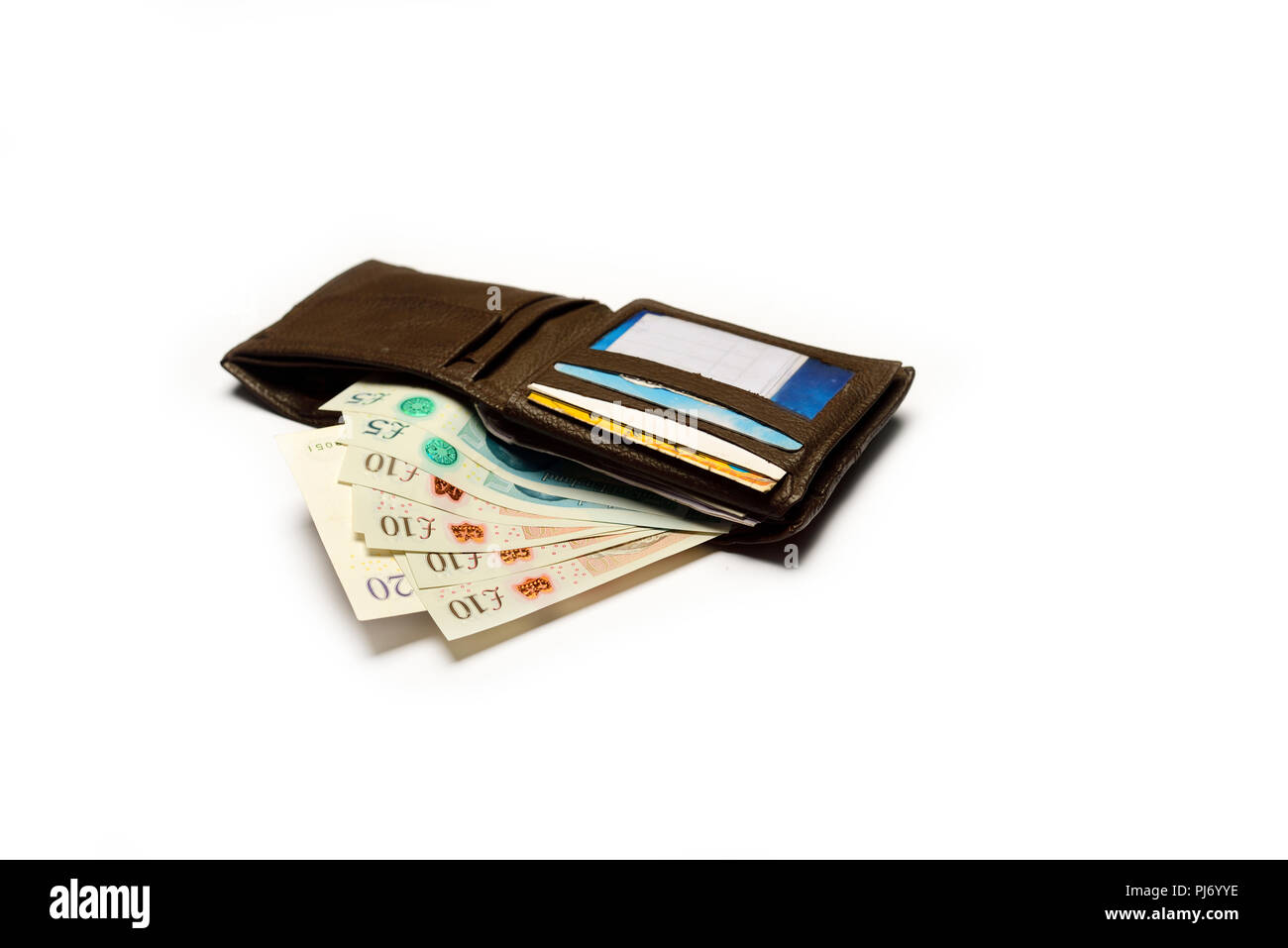 Valuta britannica sterlina in portafoglio su sfondo bianco Foto Stock