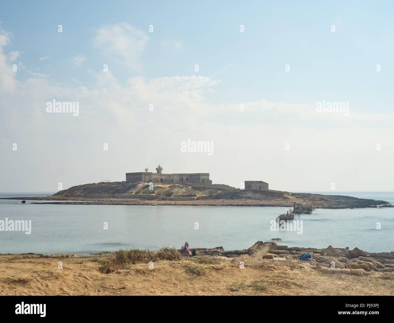Ore diurne lunga esposizione effettuata con filtri ND al tramonto di isola delle Correnti Foto Stock