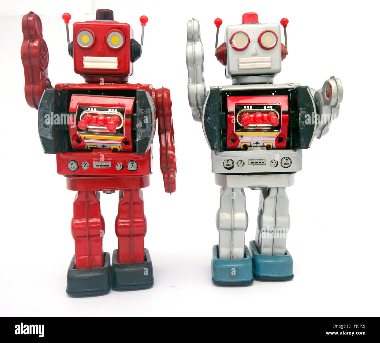 Due robot di reto salutando isolato su bianco Foto Stock
