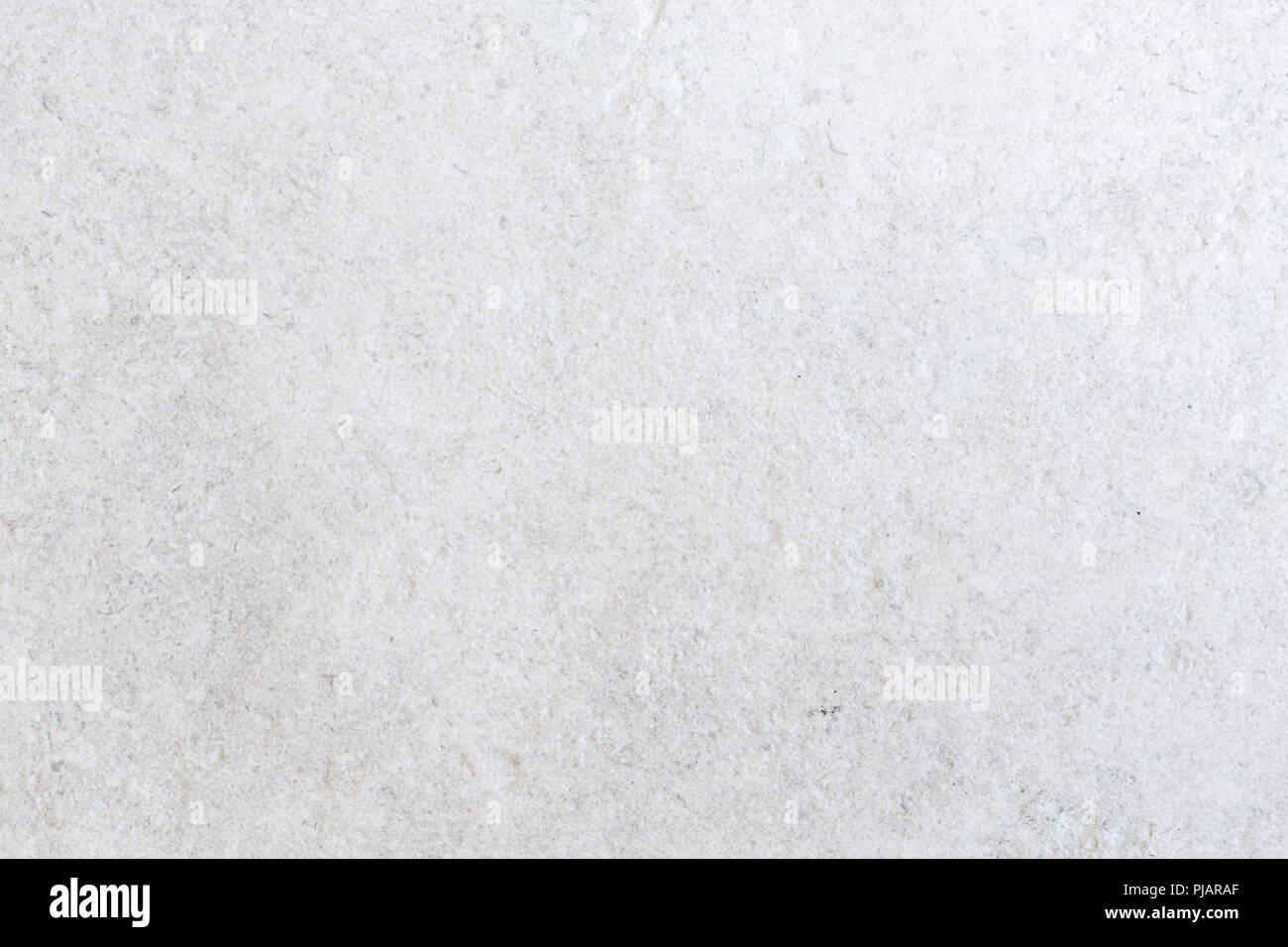 Primo piano di colore neutro texture pattern su un effetto di pietra in gres porcellanato Foto Stock