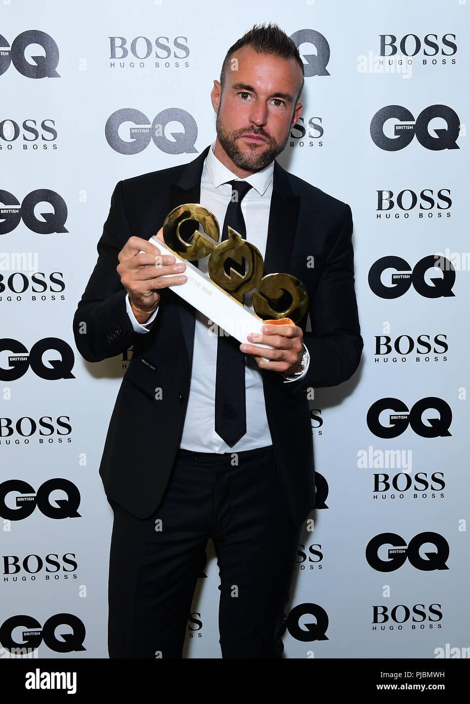 Philipp Plein in sala stampa con il marchio Award al GQ Men of the Year  Awards 2018 in associazione con Hugo Boss tenuto presso la Tate Modern di  Londra Foto stock - Alamy