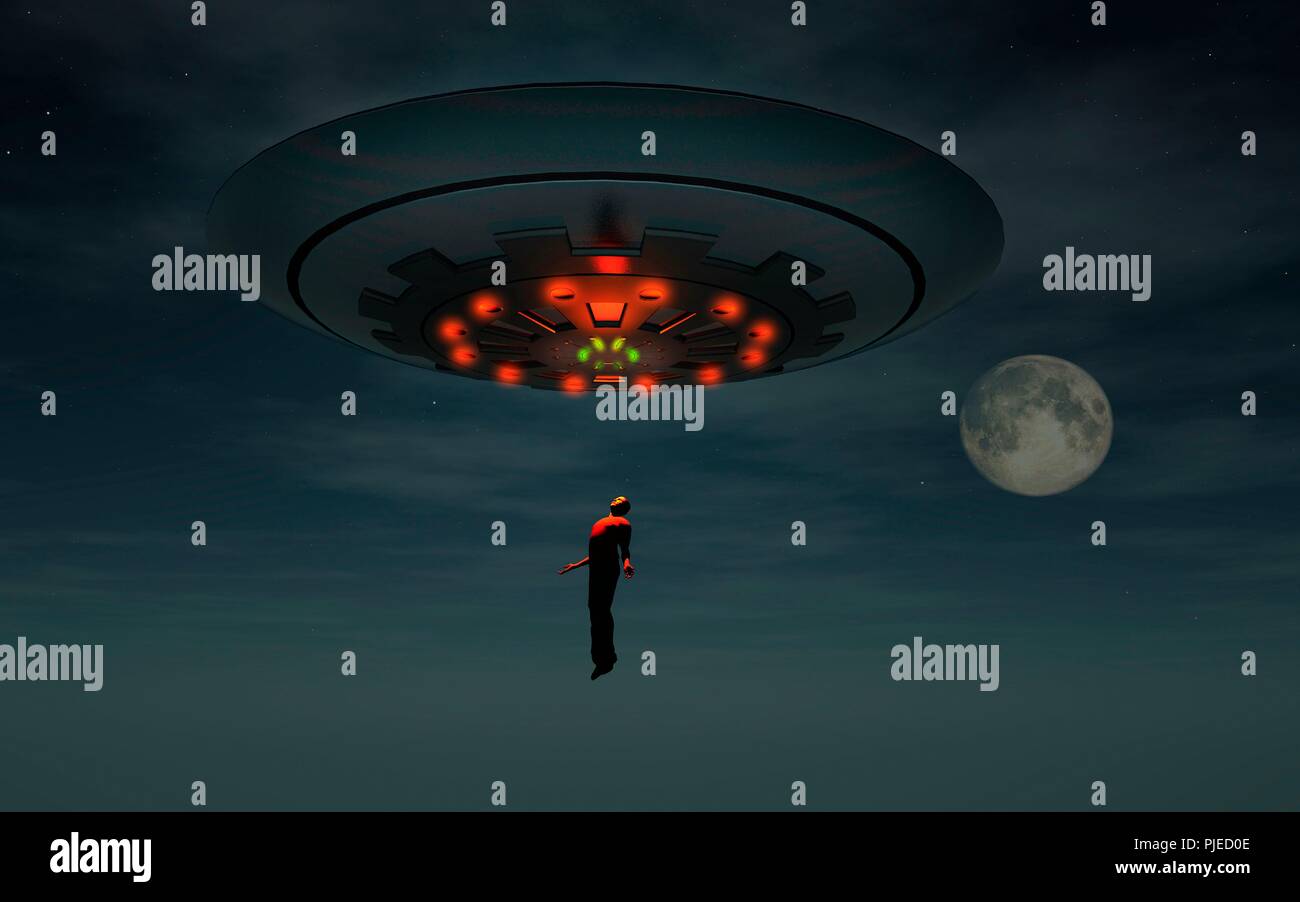 Uomo di essere rapiti da alieni. Foto Stock