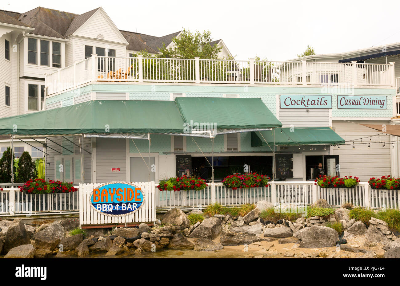 Un pranzo informale, il ristorante barbecue sulla storica città di vacanza di Mackinac Island in Michigan. Foto Stock