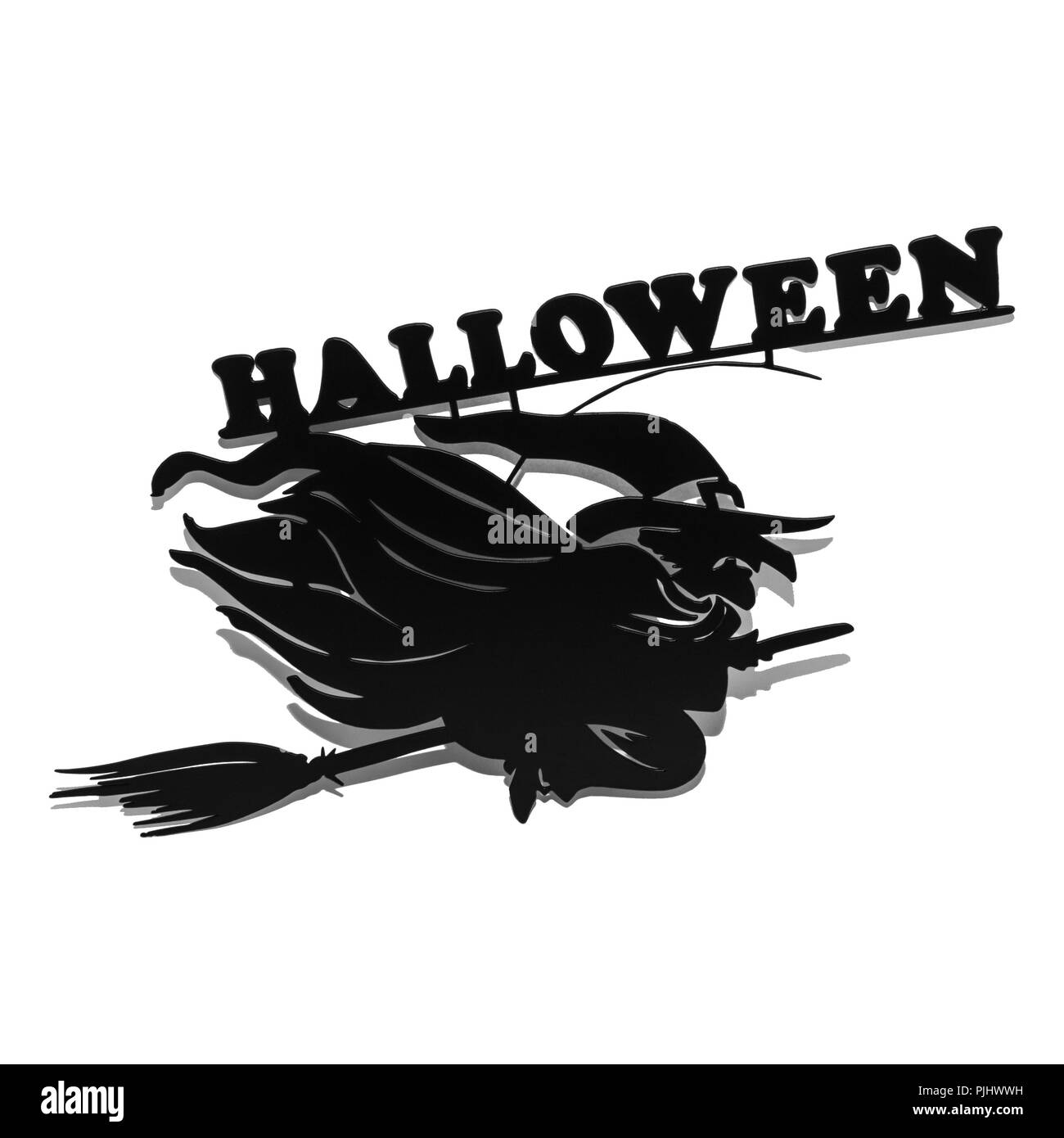 Halloween metallo vacanze top visualizza immagine della strega nero su sfondo bianco. iscrizione halloween Foto Stock