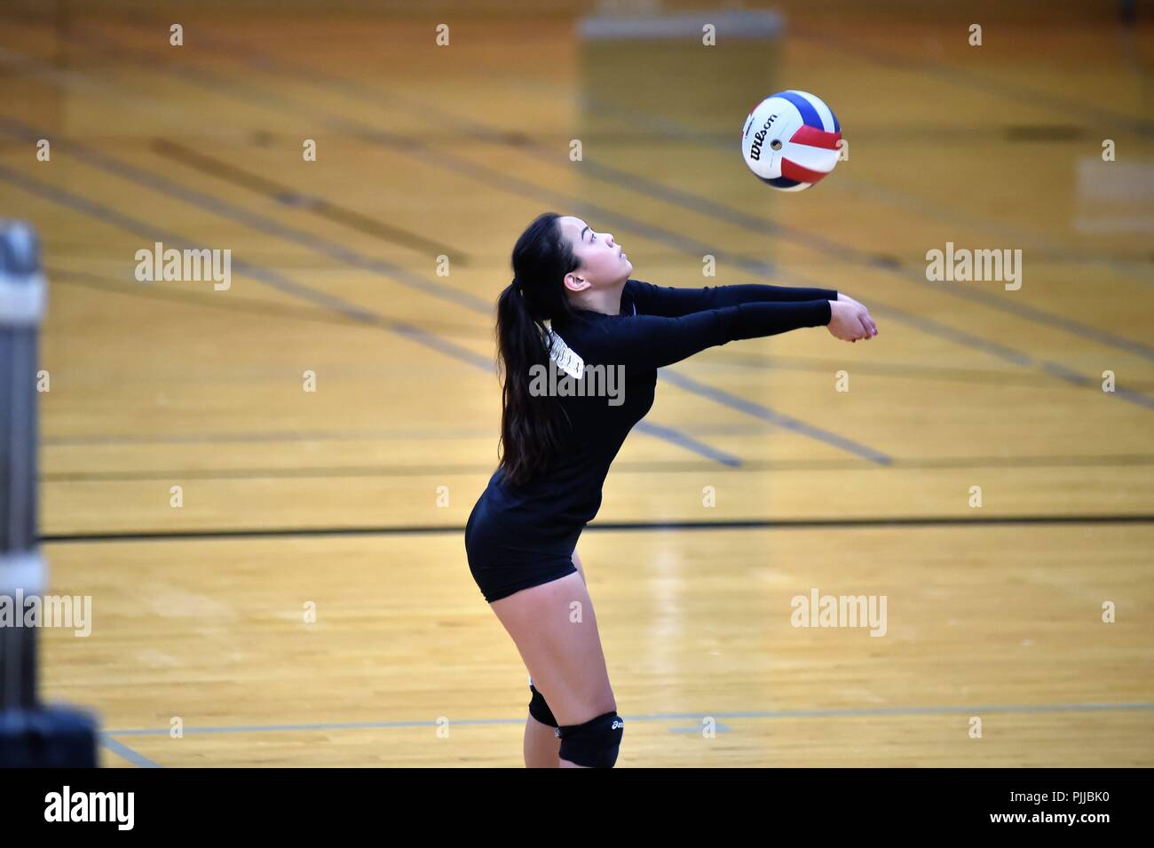 Player mantenendo un volley vivi durante un prolungato punto. Stati Uniti d'America. Foto Stock